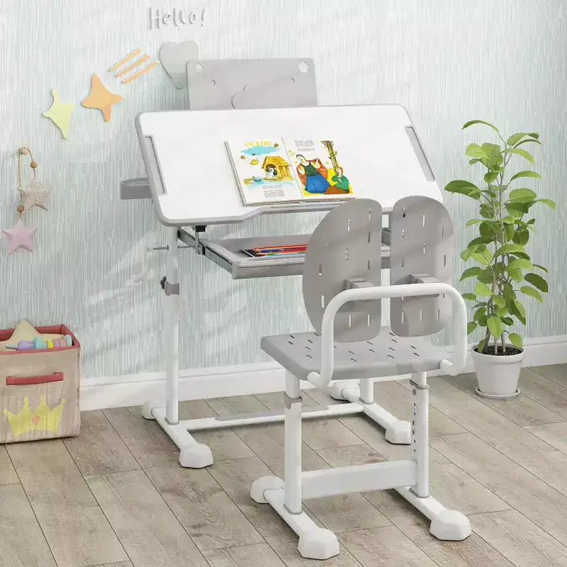 Bureau et chaise d'étude pour enfants Costway avec plateau inclinable, porte-livres et barre repose-pieds pour tout-petits